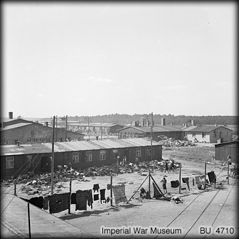 Accumulated rubbish piled around the huts of Camp No. 1 