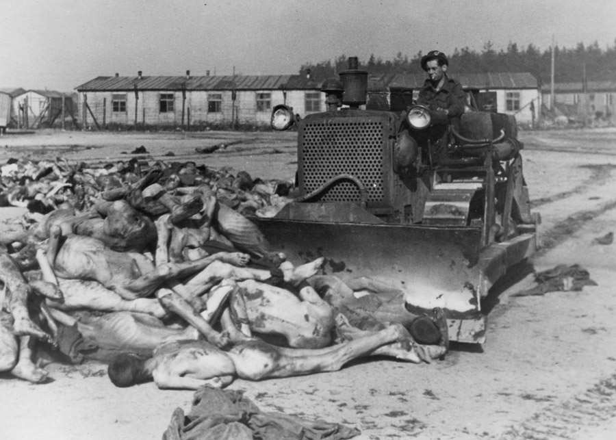 So great a task that bulldozers have to be used to push bodies into mass graves